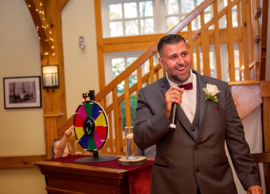 Client Wedding MC with colour wheel in background